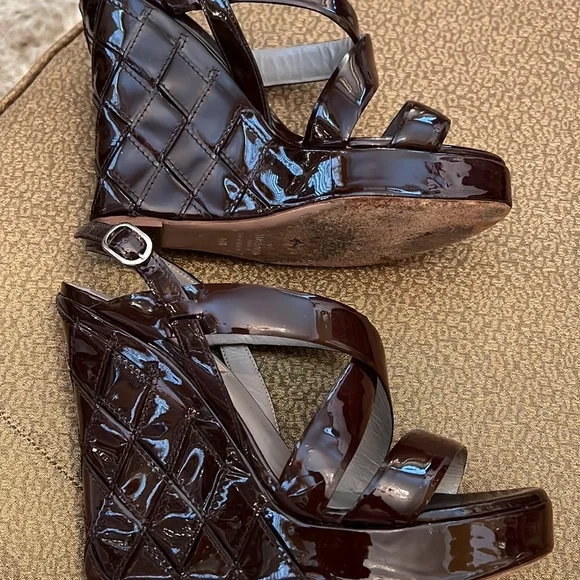 Valentino wedges in an eggplant color size 6 1/2 amazing condition